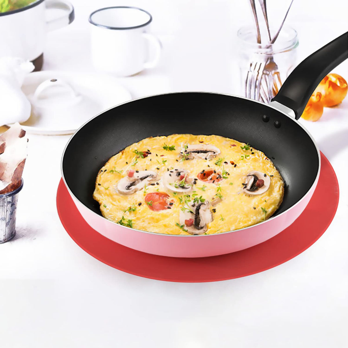 KooMall silicone-cover-pad placed over a pot to protect from splatter