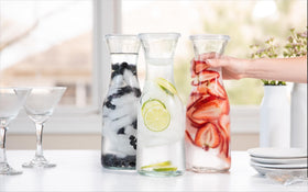 KooK Glass Carafe broad rim and slender neck for easy pouring.