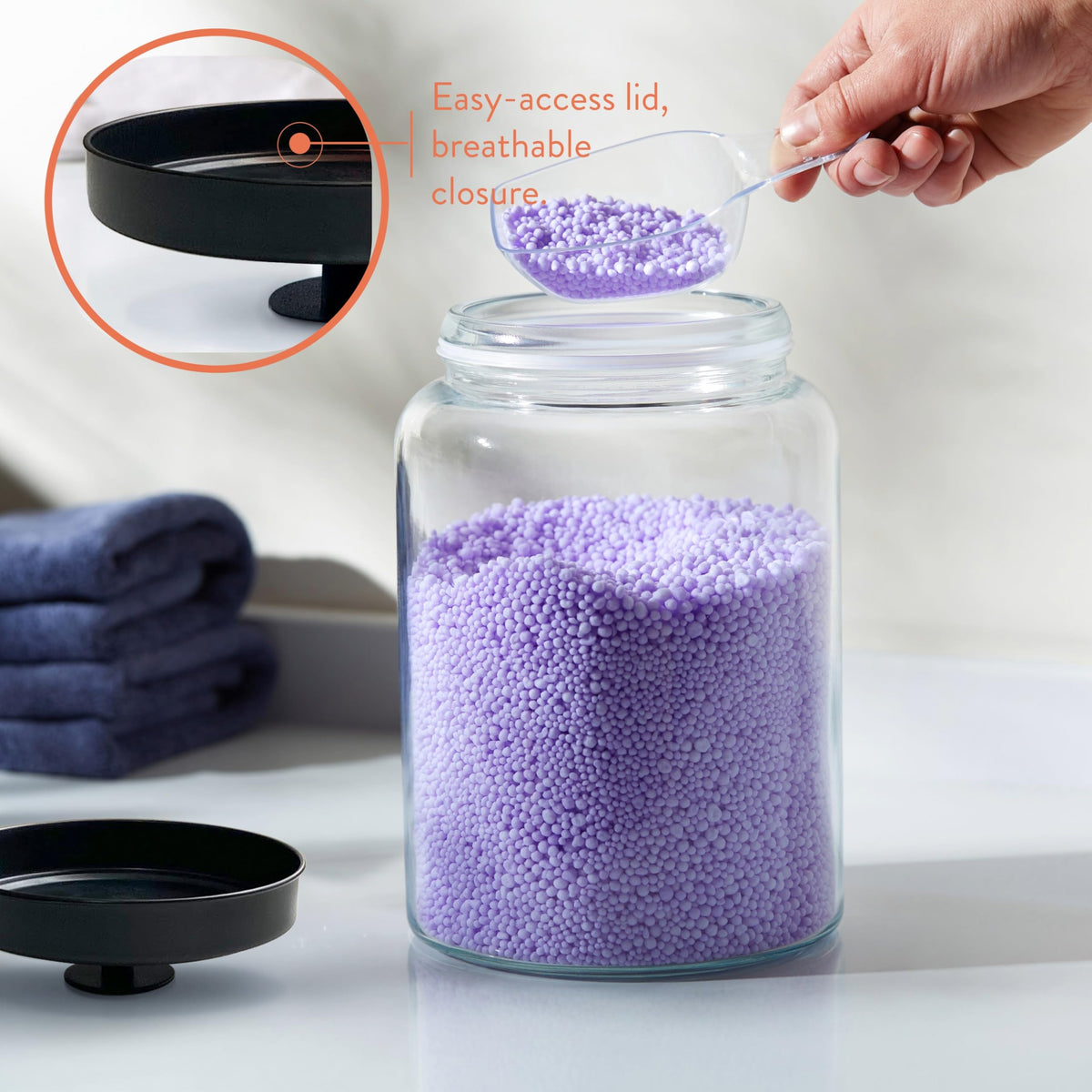 KooK glass storage lids closeup showing stainless steel easy-grip knobs