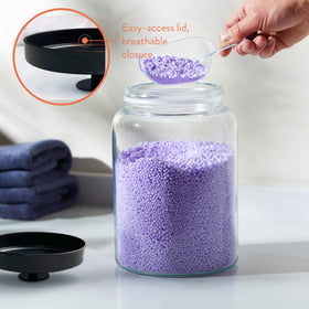 KooK glass storage lids closeup showing stainless steel easy-grip knobs