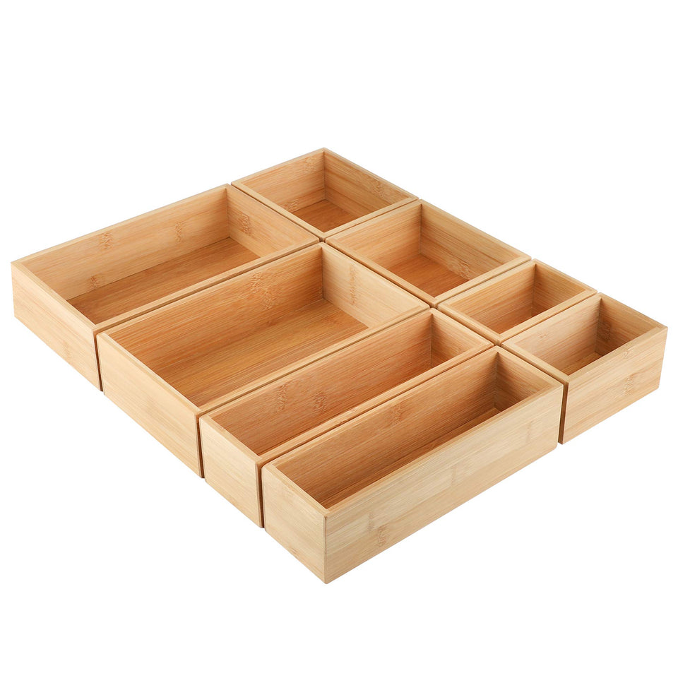Kootek bamboo drawer organizers 8-piece collection keeps utensils neatly sorted and accessible.