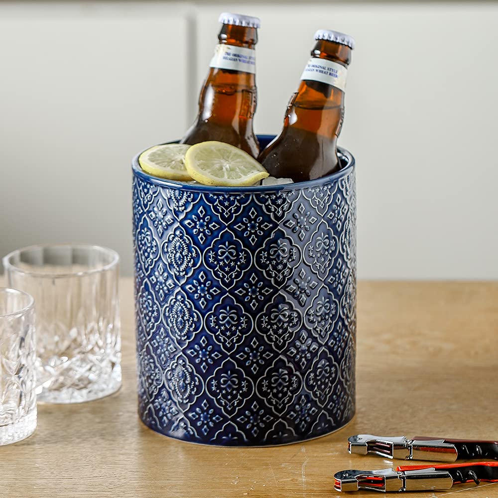 KOOV countertop organizer keeps utensils within reach while cooking.