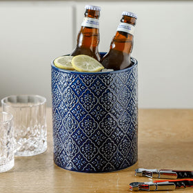 KOOV countertop organizer keeps utensils within reach while cooking.