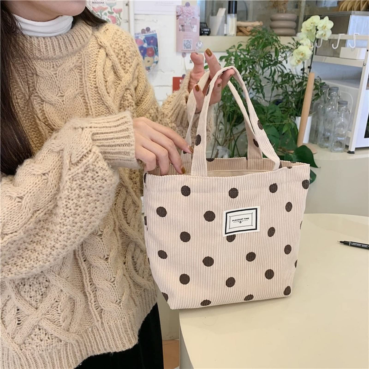 Kovewon small tote pocket interior neatly organized.