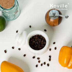 Koville easy-clean marble salt container resists stains and odors.