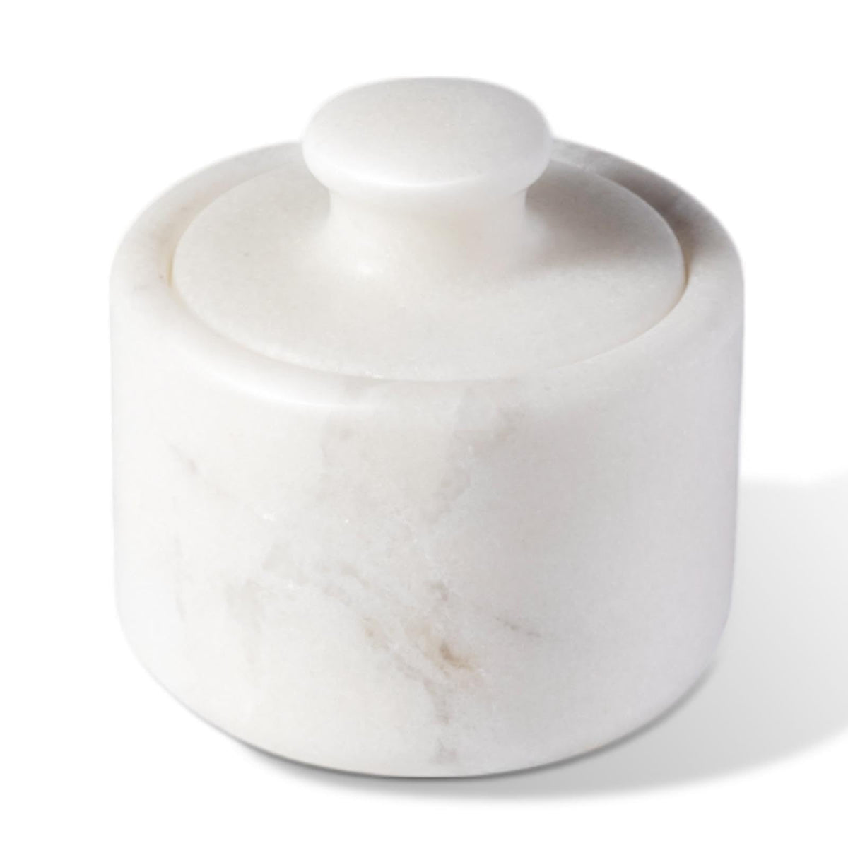 Koville marble salt cellar with lid on white surface, sturdy countertop companion.