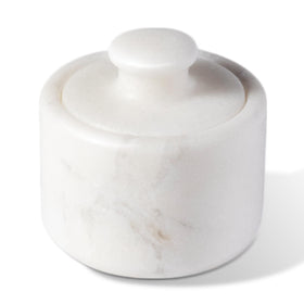 Koville marble salt cellar with lid on white surface, sturdy countertop companion.