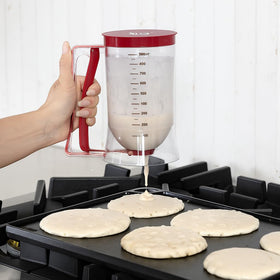 KPKitchen pancake dispenser trigger red handle for effortless batter control.