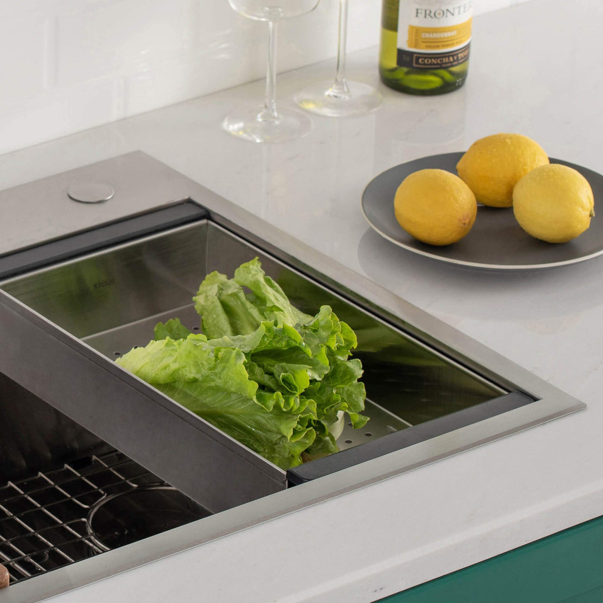 Kraus colander lets you rinse produce right over the workstation, keeping counters clean.