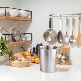 KSENDALO pitcher with handle offers easy grip and controlled pouring for any kitchen task.