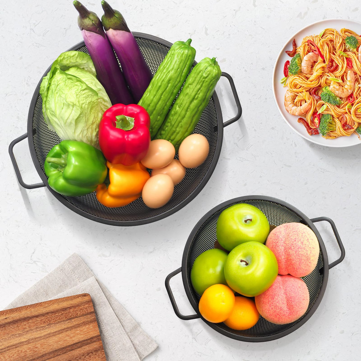 Kteniy black colander handle closeup shows secure grip for easy draining
