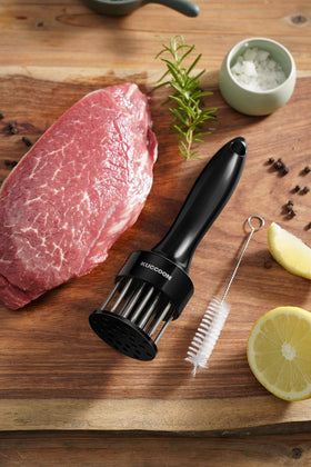 KUCCOON meat tenderizer creating precise perforations for even cooking.