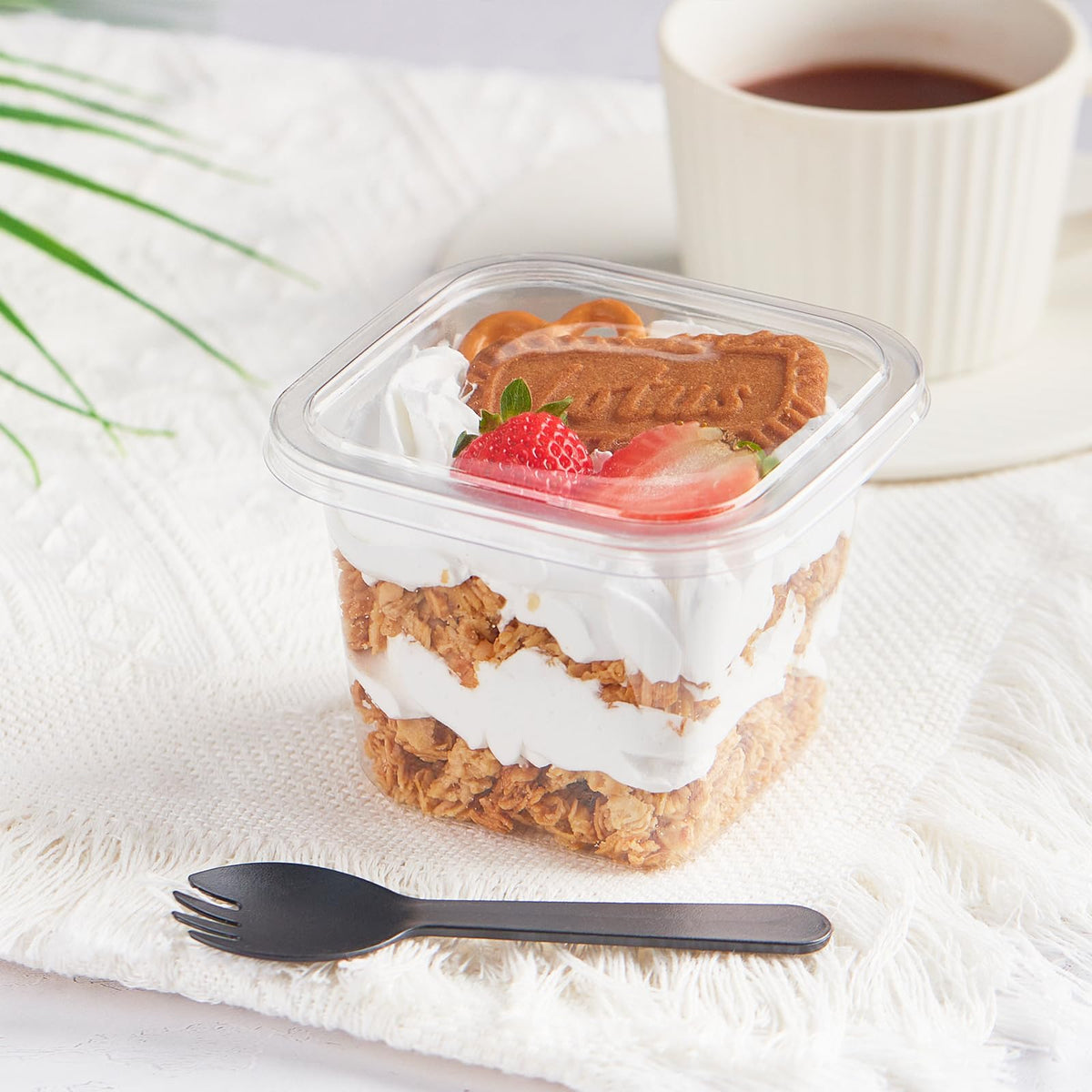 Kucoele 50-pack dessert cups include sporks for quick serving.
