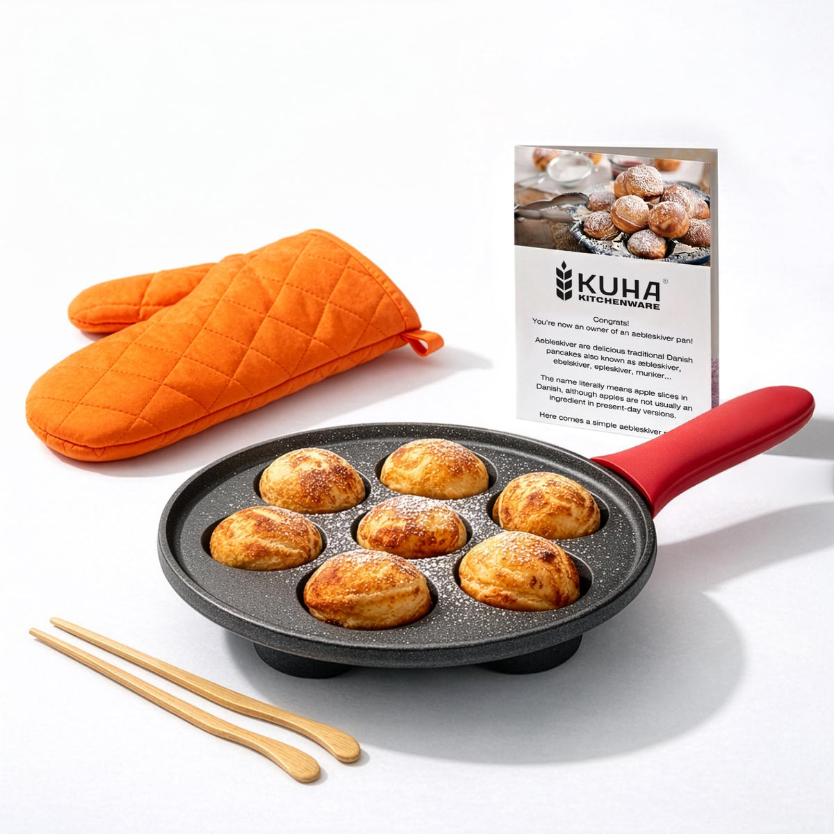 KUHA cast iron aebleskiver pan top view promotes even browning.