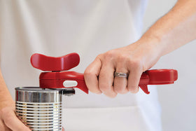 Lids removed via mini-pliers on Kuhn Rikon opener for hands-free use