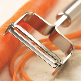 Kuhn Rikon julienne peeler ergonomic stainless steel handle reduces fatigue.