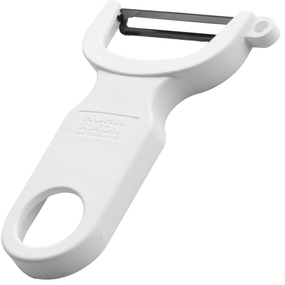 Kuhn Rikon Original 4-Inch Peeler with sharp carbon steel blade for precise peeling