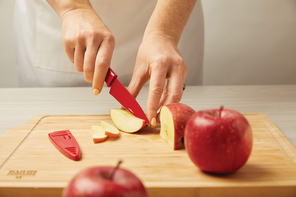 Kuhn Rikon straight paring knife peeling apple with ease