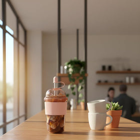 Kuoleopa reusable straw and carrying loop simplify transporting drinks.