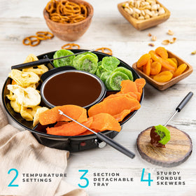Kusini fondue skewers included for dipping fruits, marshmallows, and more