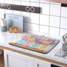 Kwlegh Daisy mat features a hanging tab for easy air drying