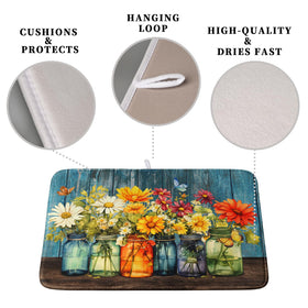 Kwlegh Daisy dish drying mat with absorbent microfiber dries dishes efficiently.