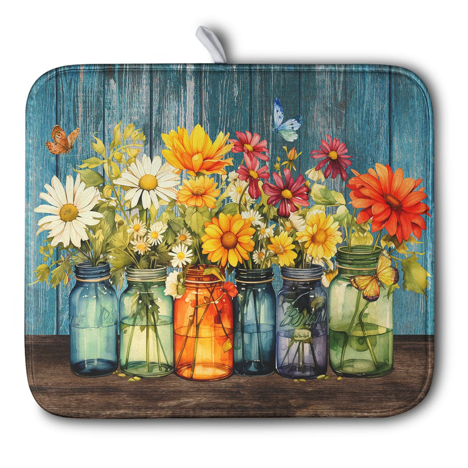 Kwlegh Daisy dish drying mat on counter keeps surfaces dry and organized.