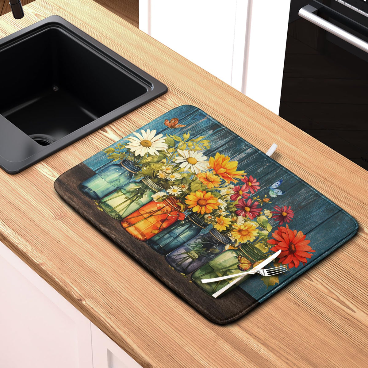 Kwlegh Daisy mat fits most counters and cushions delicate items.