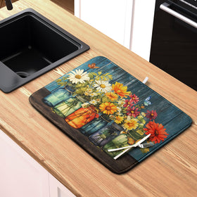 Kwlegh Daisy mat fits most counters and cushions delicate items.