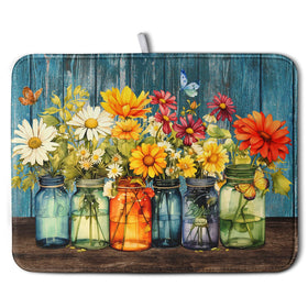 Kwlegh Daisy dish drying mat on counter keeps surfaces dry and organized.