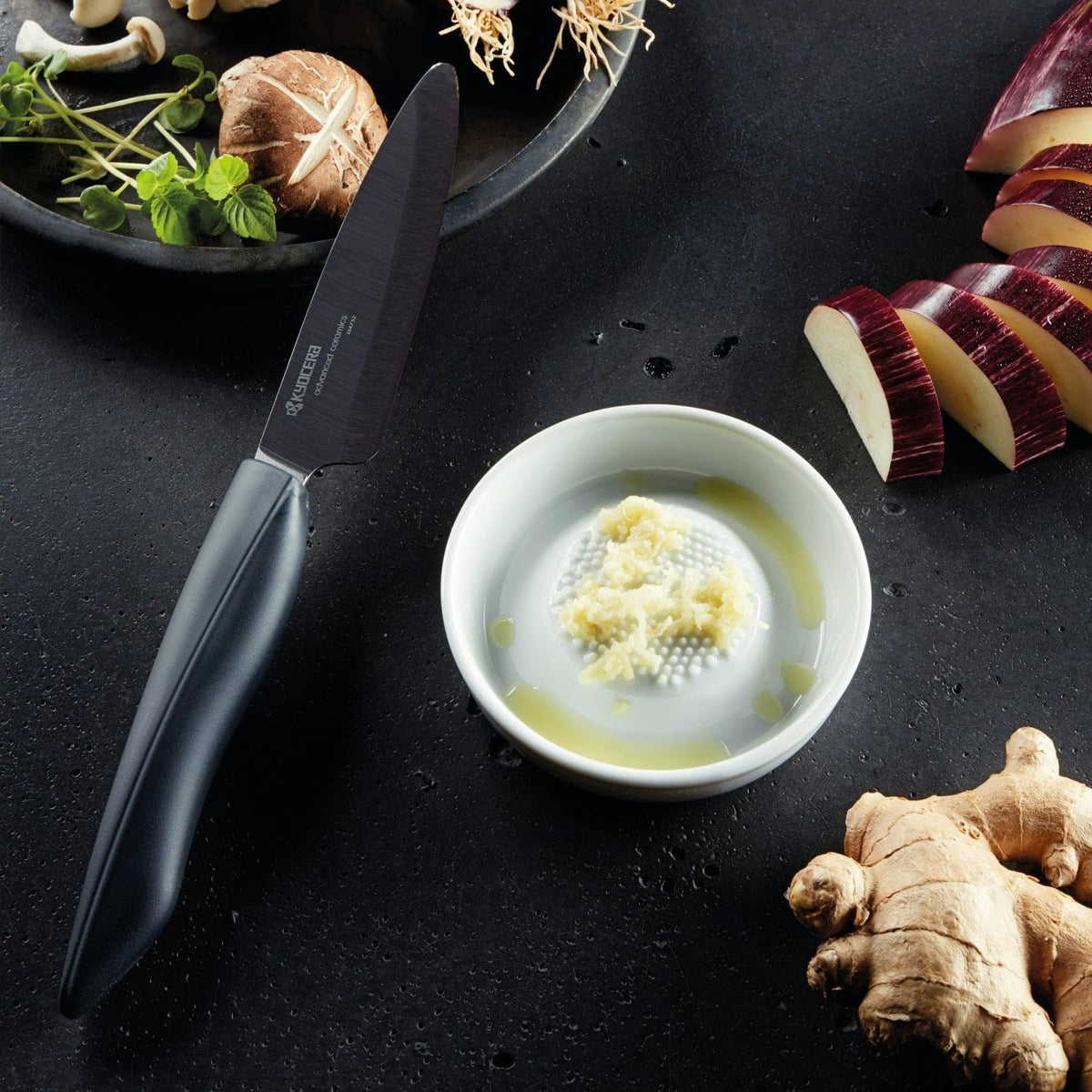 KYOCERA grater for garlic delivering smooth shredding and easy cleanup.