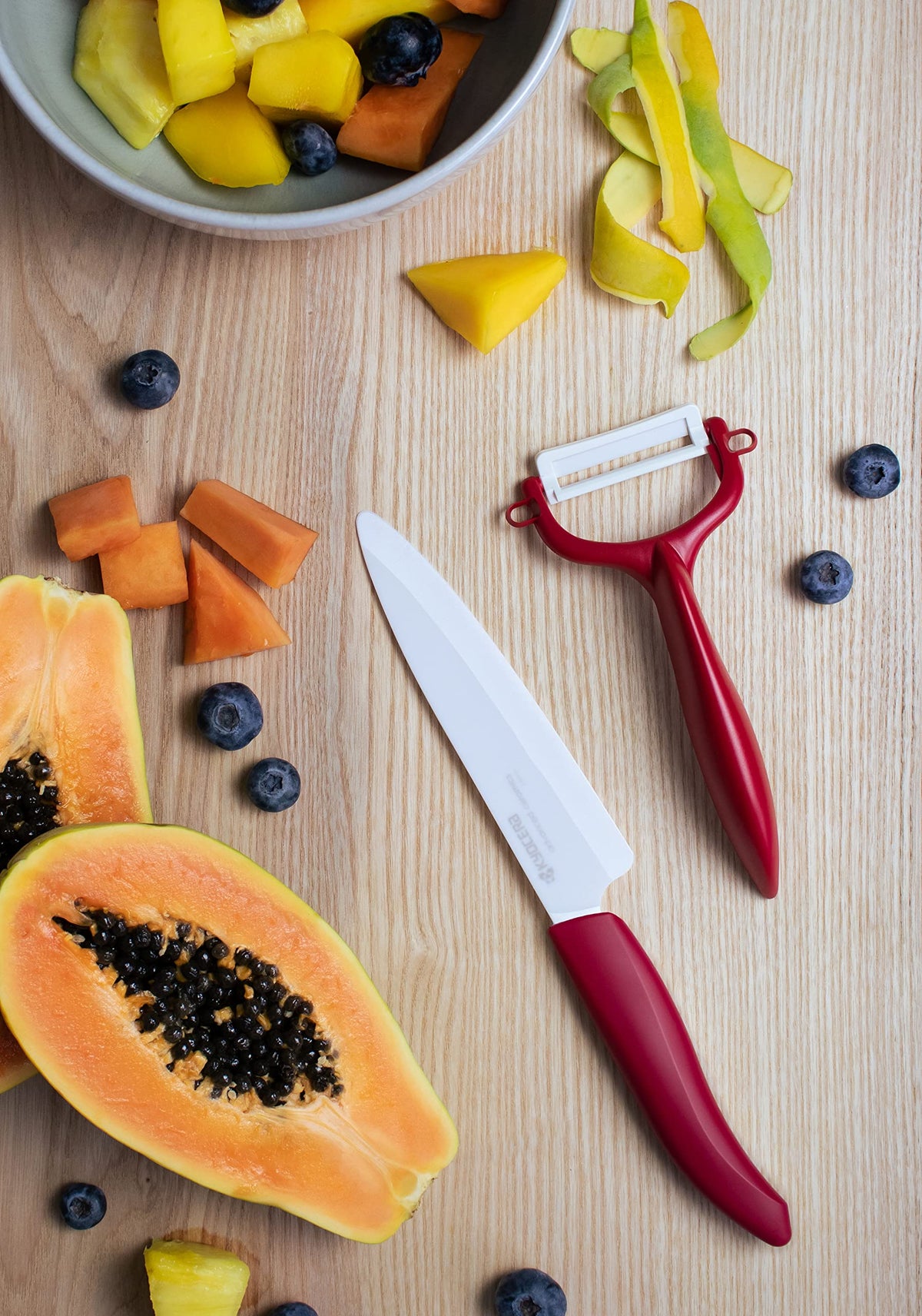 Kyocera Y peeler red blade glides smoothly for quick fruit and vegetable prep