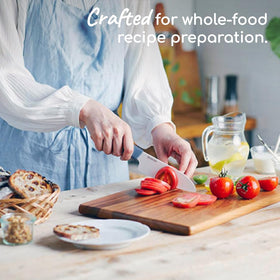 Kyocera Revolution fruit and vegetable slicing with sharp ceramic edge.