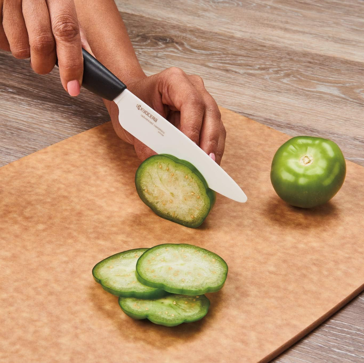 Kyocera Revolution lightweight handle design for comfortable chopping.