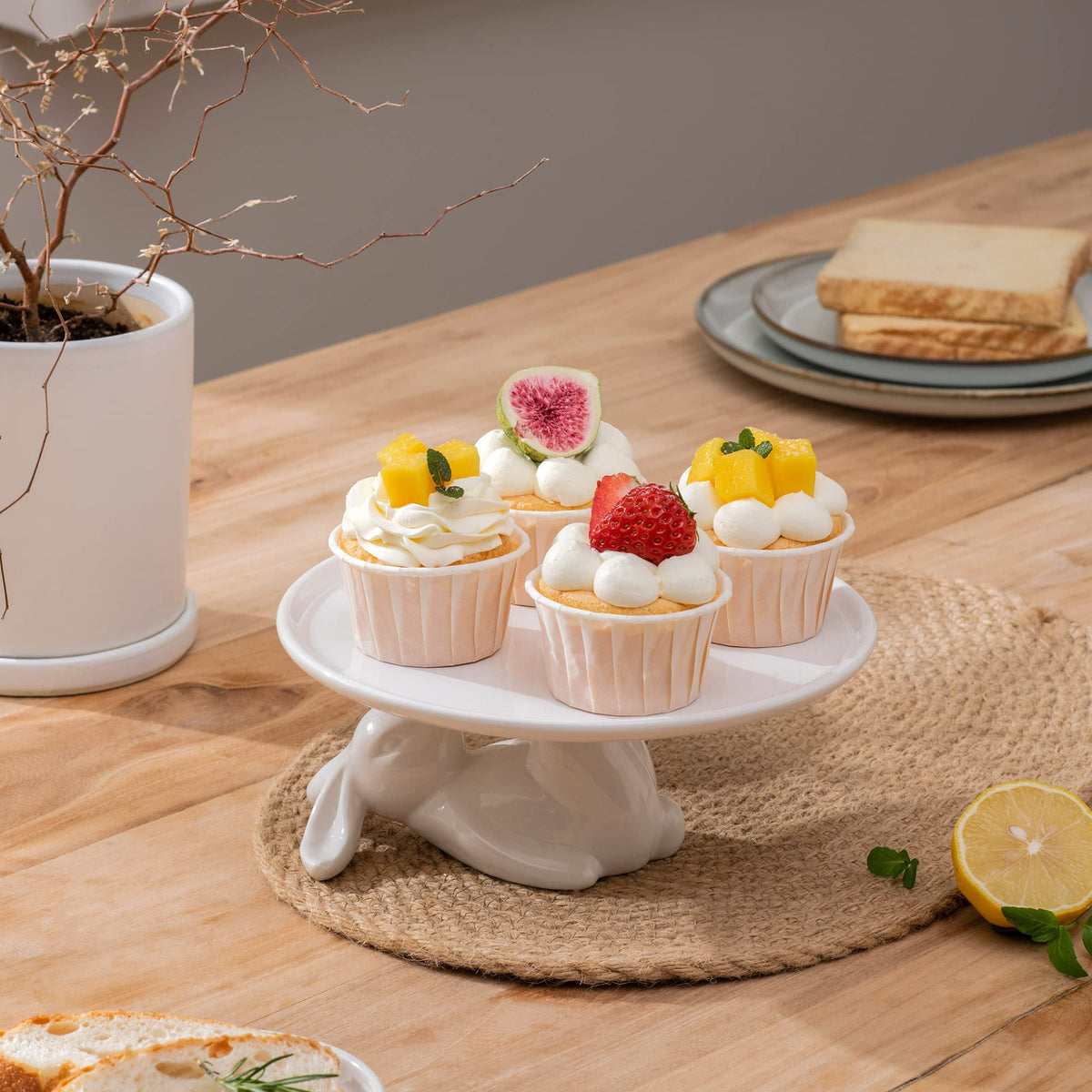Close-up of LA JOLIE MUSE bunny cake stand showing handcrafted glaze detail