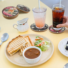 Laisgee coaster set with folding fans design enhances gifting and desk decor.