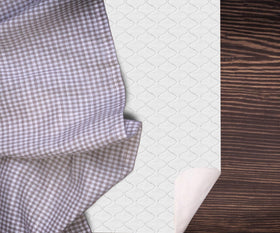 LAMINET non-slip underlay keeps pad in place during meals