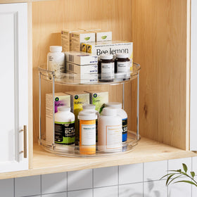 LAMU two-tier lazy Susan turntable keeps skincare and perfumes neatly organized for quick selection.