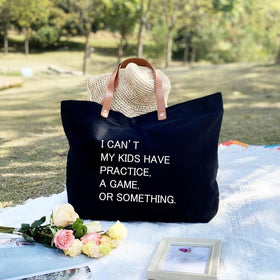 Lamyba tote bag side view highlights easy shoulder carry and balanced weight distribution.