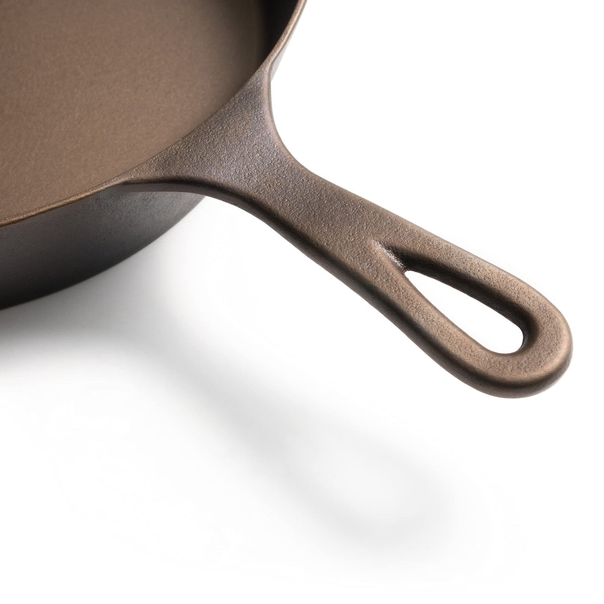Lancaster skillet shows ergonomic handle and pour spouts for controlled pouring.