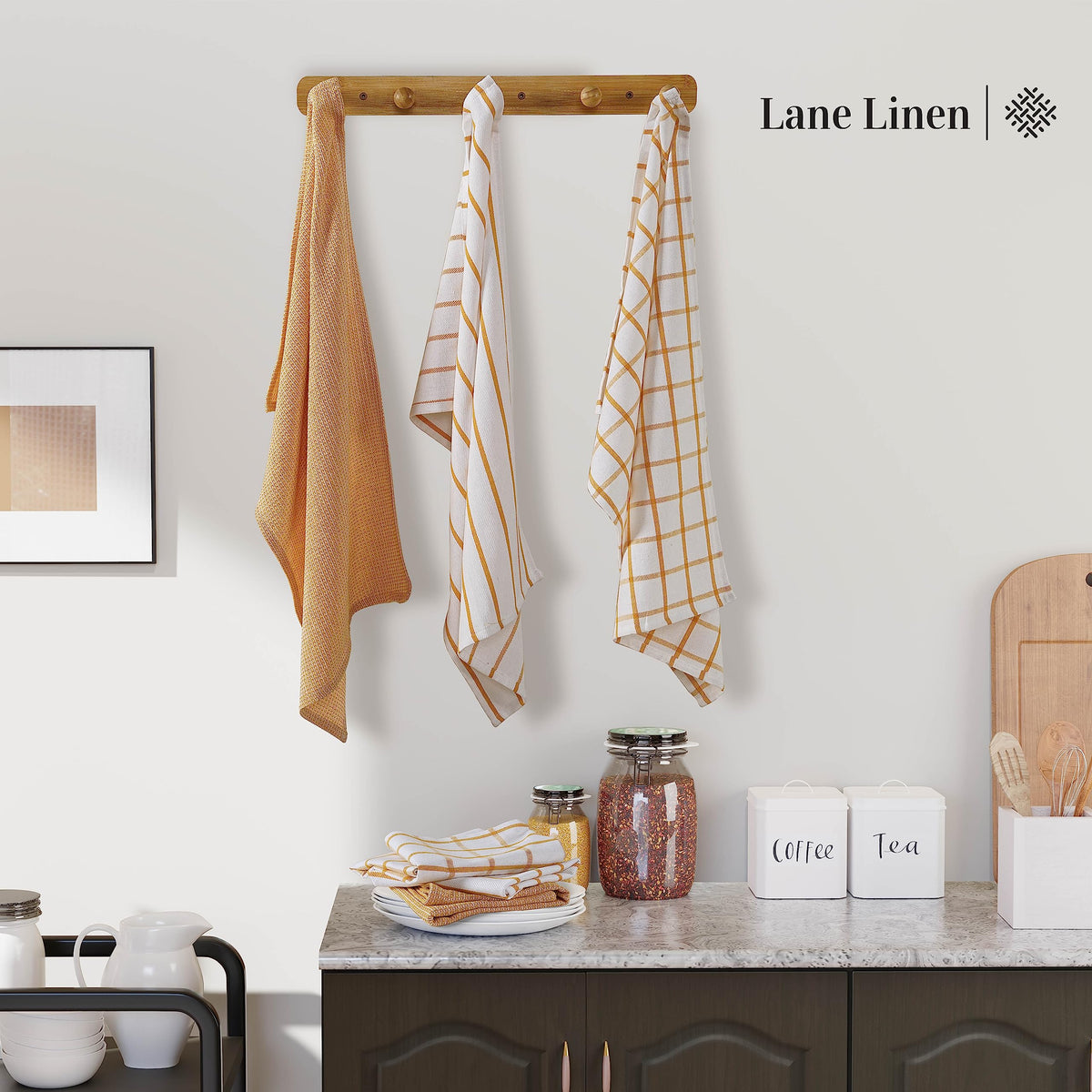 Lane Linen towel beside a cup and utensils demonstrating versatility.