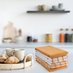 Lane Linen kitchen towel showing multi-purpose use as napkin.