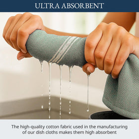 Lane Linen olive towels absorbing liquid quickly after a spill
