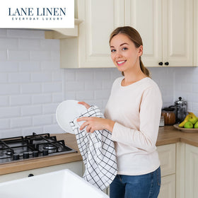 Lane Linen striped design towels add a stylish touch while drying hands.