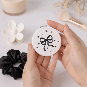 LANGASQUE silk scrunchie offers gentle hold and luxe feel.