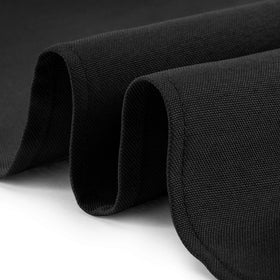 Wedding banquet scene with black Lann's Linens tablecloth creating elegant ambience