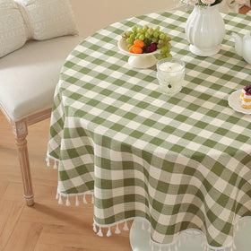 Laolitou tassel-edge round tablecloth adds elegant fringe detail.