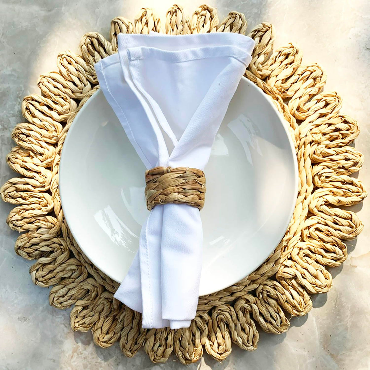 Laquedecraft napkin rings arranged on a dining table for warm boho farmhouse styling