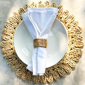Laquedecraft napkin rings arranged on a dining table for warm boho farmhouse styling
