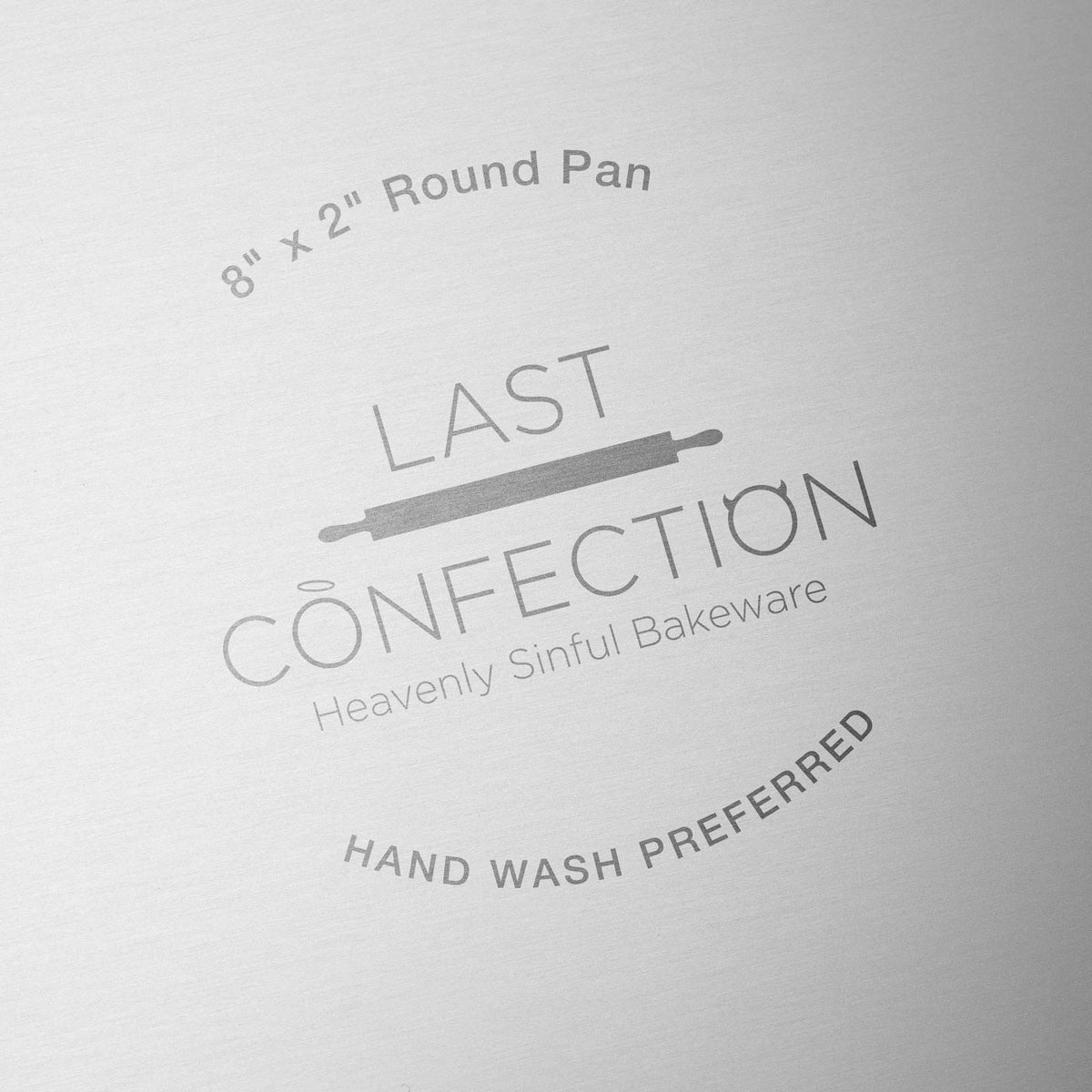 Last Confection straight-sided cake pan edge close-up emphasizing clean layer results